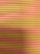 End of Bolt Sale banner with colorful fabric bolts on display