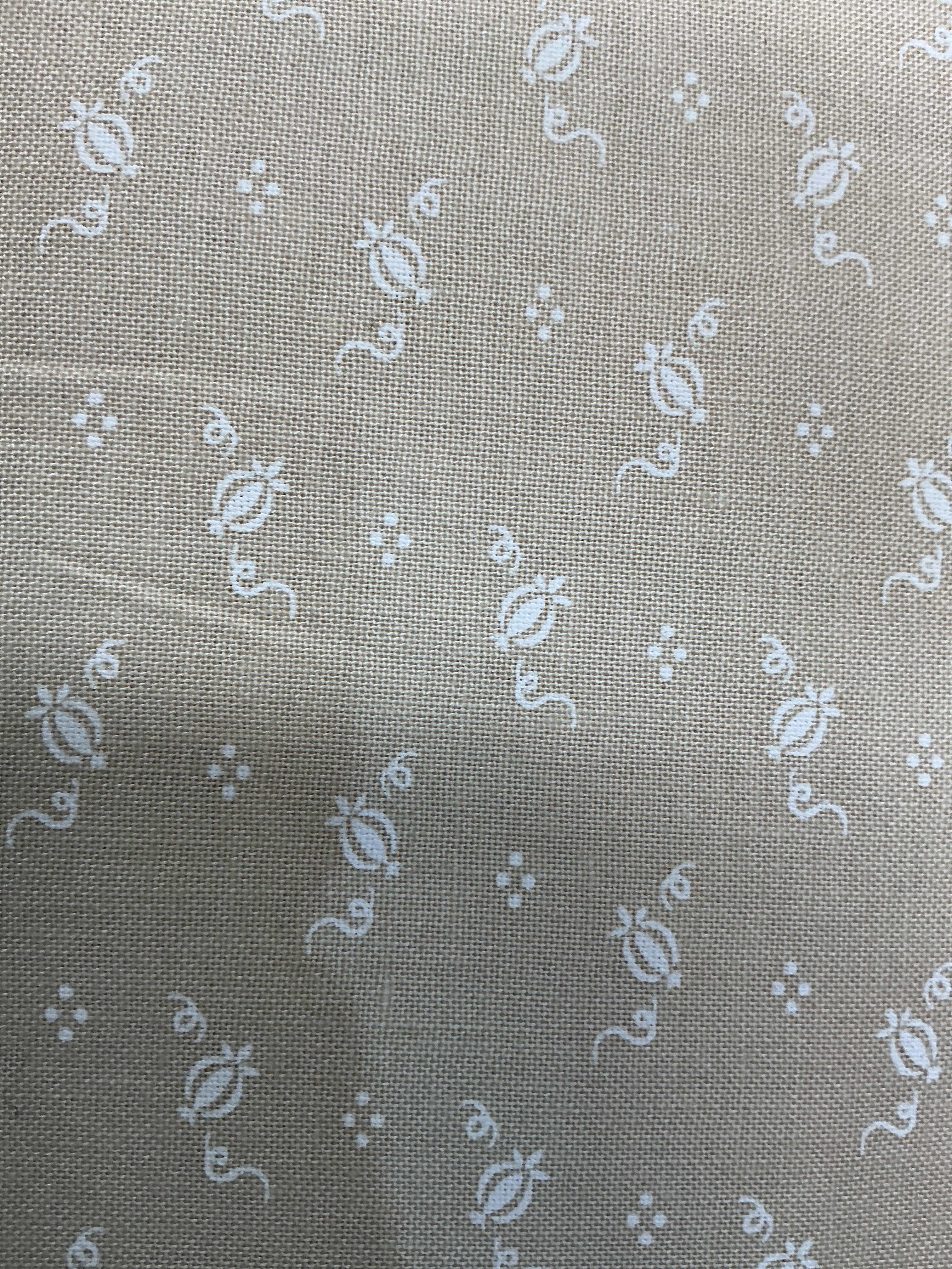 Rolls of fabric labeled 5-yard cuts on sale