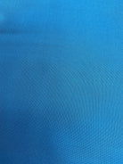 Stack of colorful 5-yard fabric cuts for sale