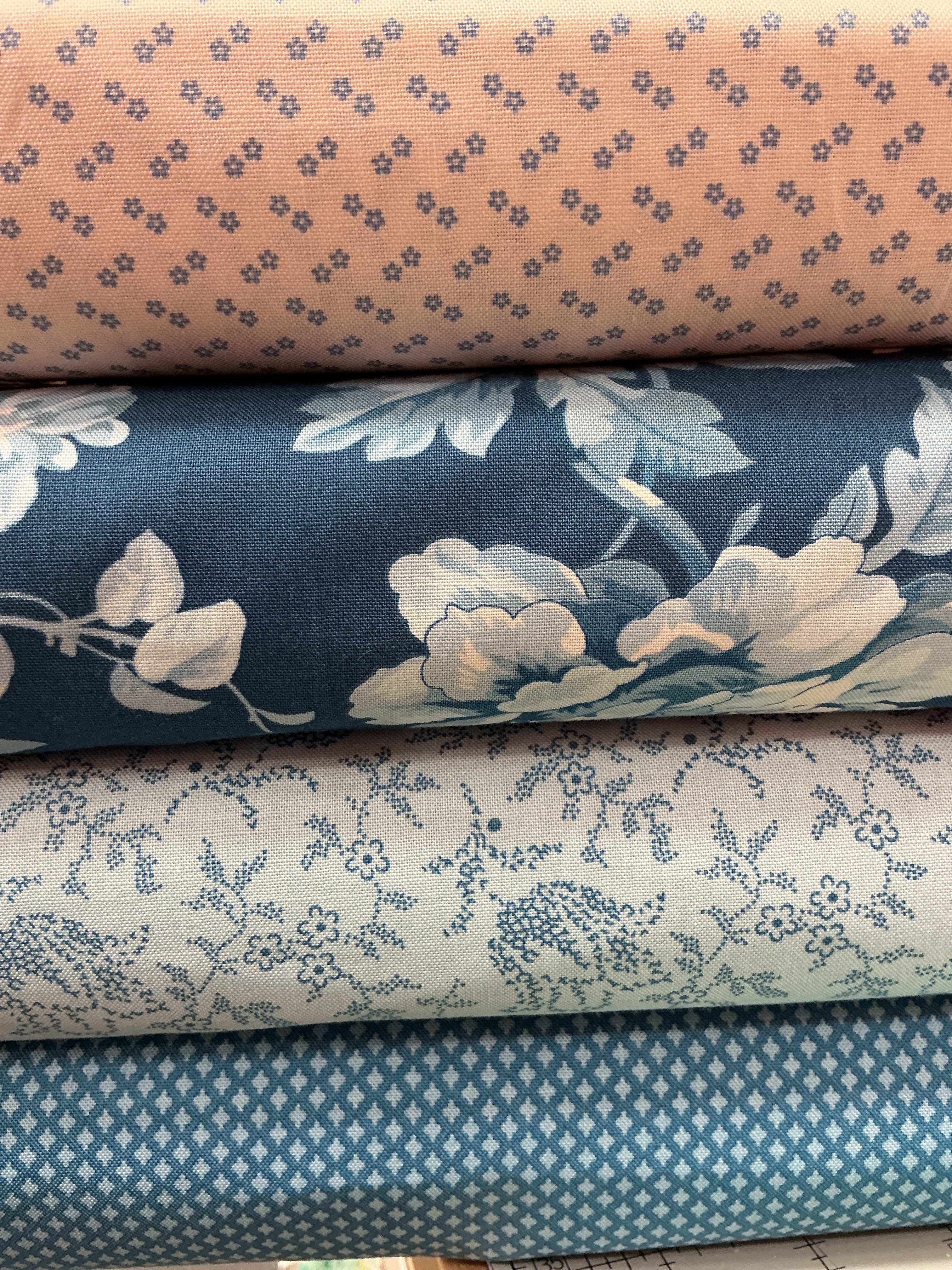 4 Yard Quilt Bundle by Bella Rose Quilts featuring assorted fabric pieces for quilting projects