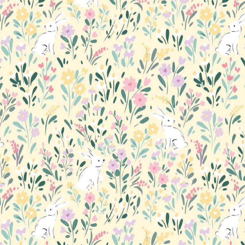 Bunny Blossoms Bunny Meadow fabric with white bunnies and colorful spring flowers on light yellow background
