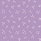 Bunny Blossoms Ditsy Flowers purple fabric with small white and pink floral prints by Dominika Godette for Cloud9 Fabrics
