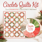 Circlets Quilt Kit featuring Poinsettia & Pear quilt top with pattern and fabric components
