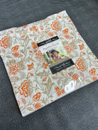 Frida Lap Size Quilt Kit with 12 fabric half-yard cuts, digital pattern, accent, and binding for lap quilt sewing project