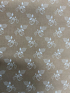 Stack of colorful 5-yard fabric cuts for sale
