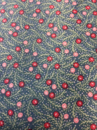 Rolls of 5-yard fabric cuts on sale displayed in a store