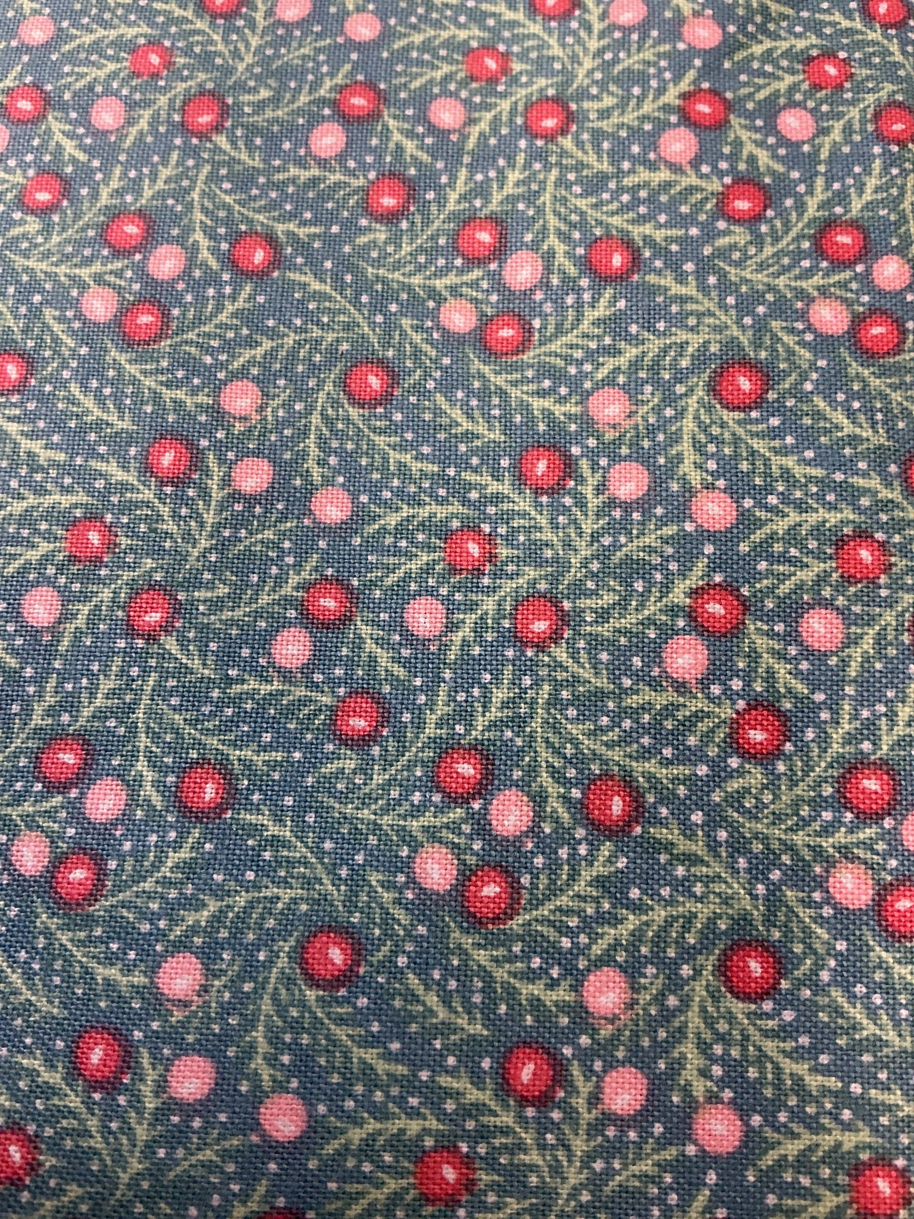 Rolls of 5-yard fabric cuts on sale displayed in a store