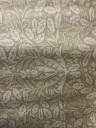 Rolls of colorful fabric labeled 5-yard cuts on sale