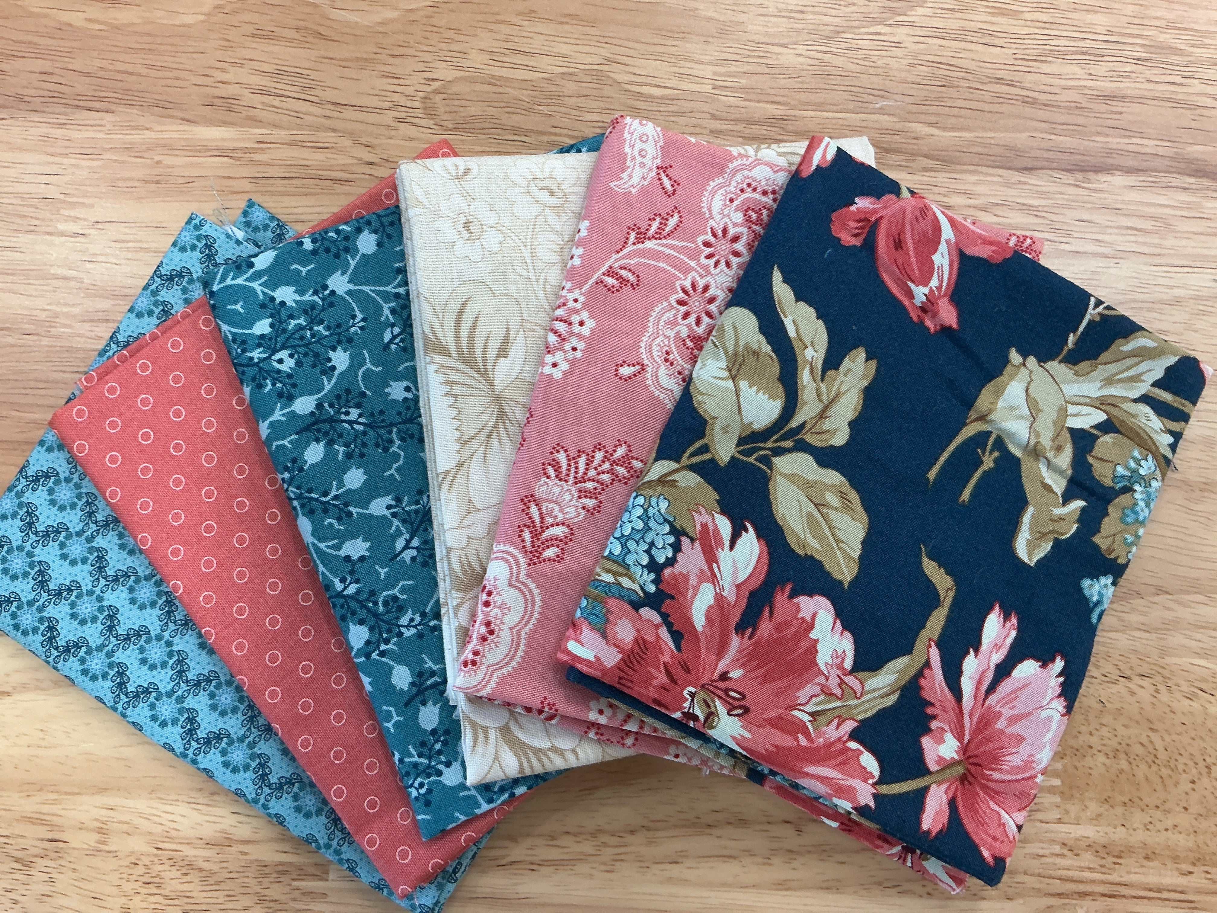 M50 Happy Go Lucky quarter-yard fabric bundle curated by Bella Rose Quilts for mini mystery quilt event