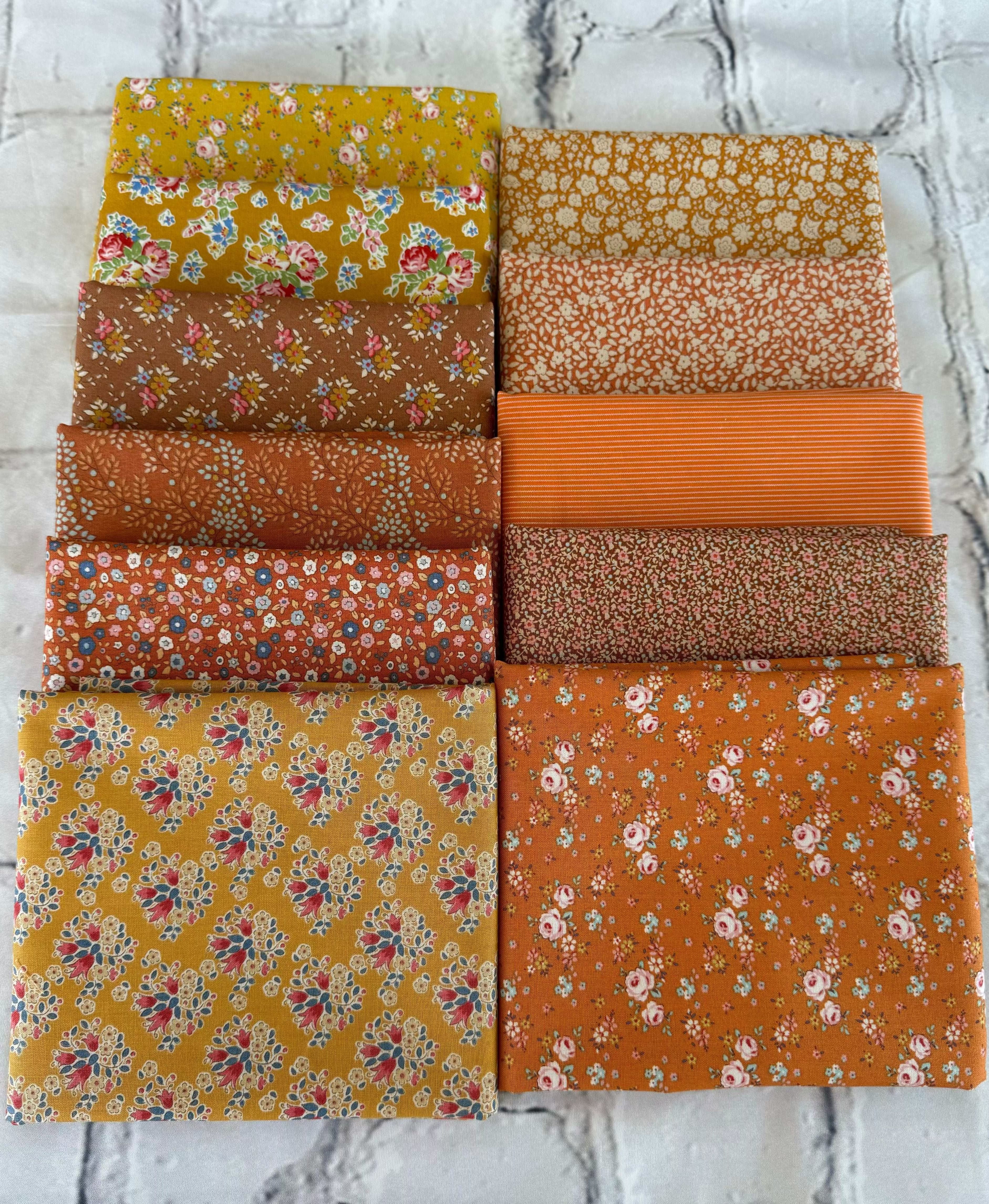 11 FQ’s Tilda Fall fabric bundle with autumn floral and striped patterns in warm tones