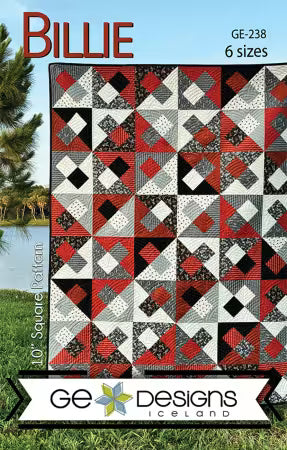 Billie Quilt Pattern by GE Designs with six size options and red, black, and white geometric quilt design outdoors