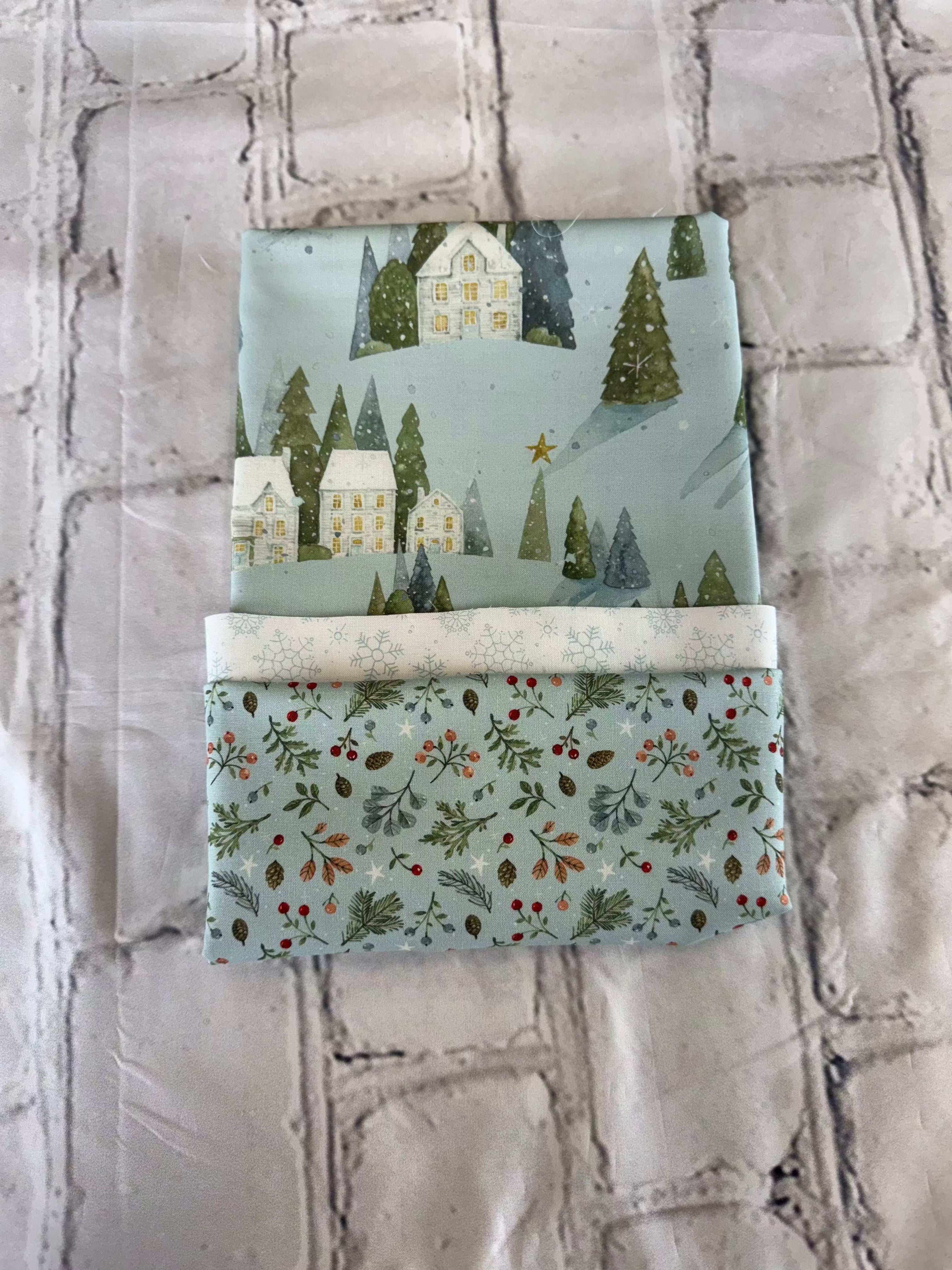 Pillowcase kit with magical winterland fabric featuring houses and trees by Bella Rose Quilts