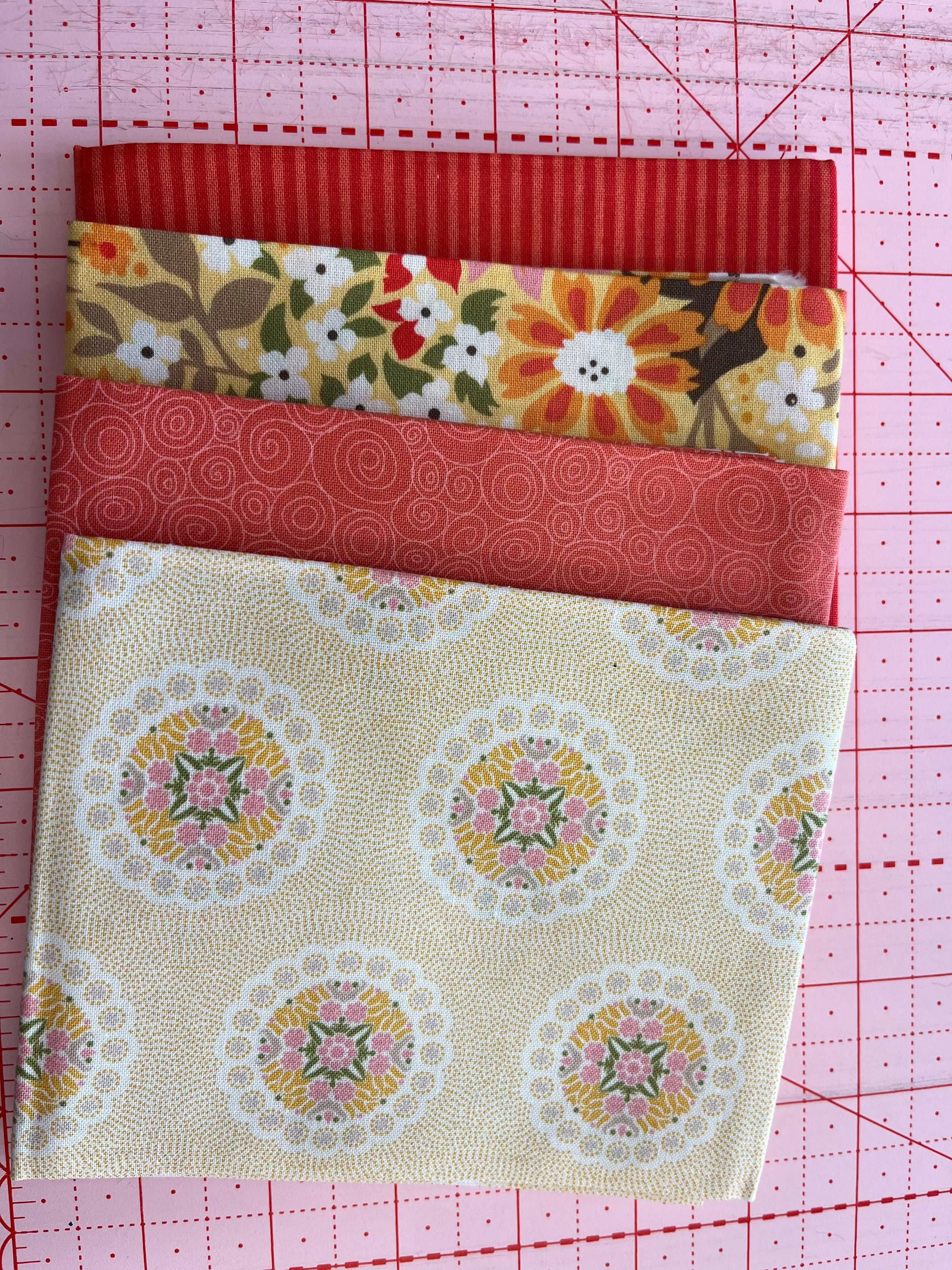 4-Yard Quilt Kit A9 with red, floral, and circular patterned fabrics