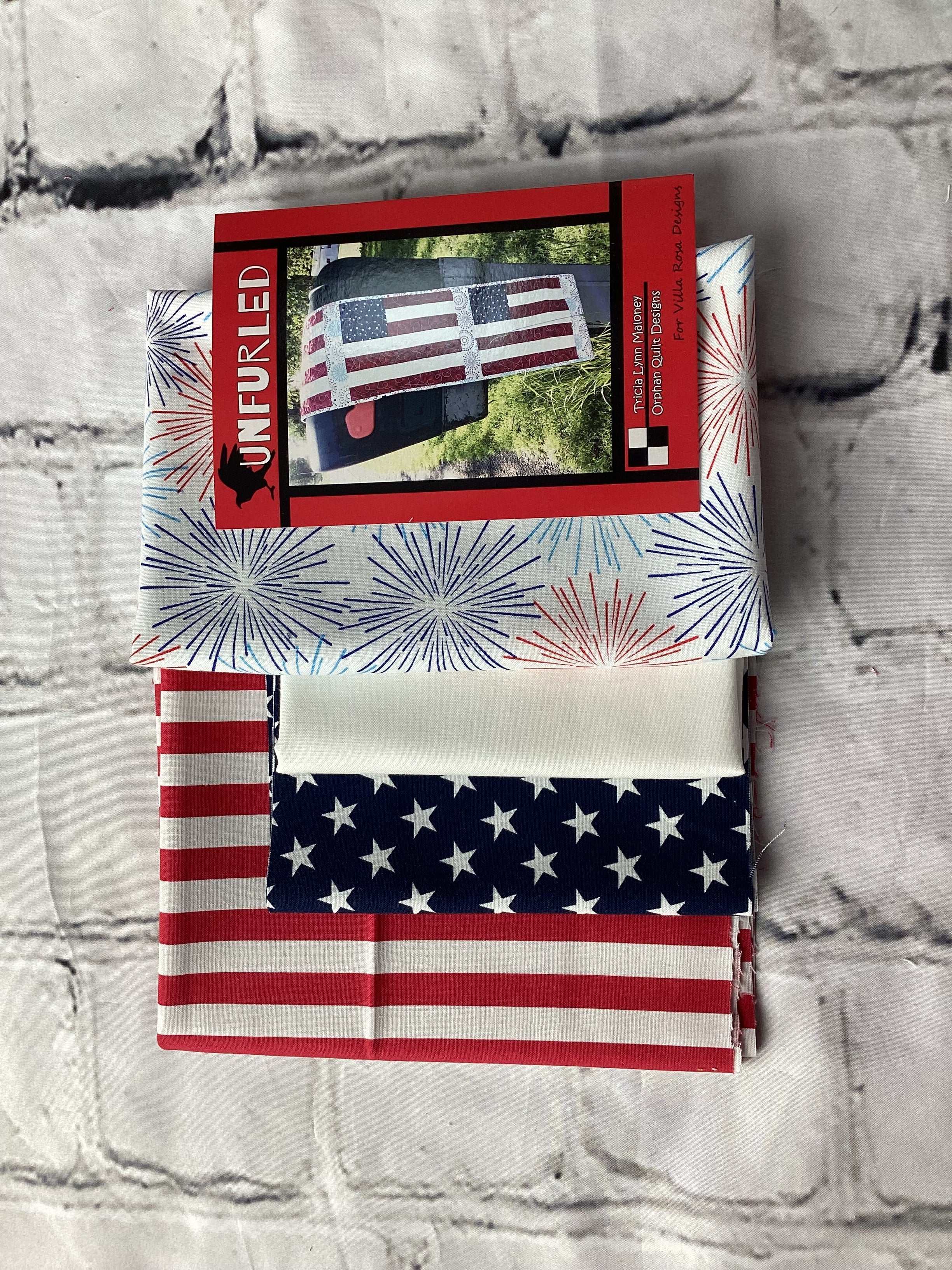 Unfurled Quilt Kit with patriotic fabric featuring stars and stripes by Villa Rosa Designs