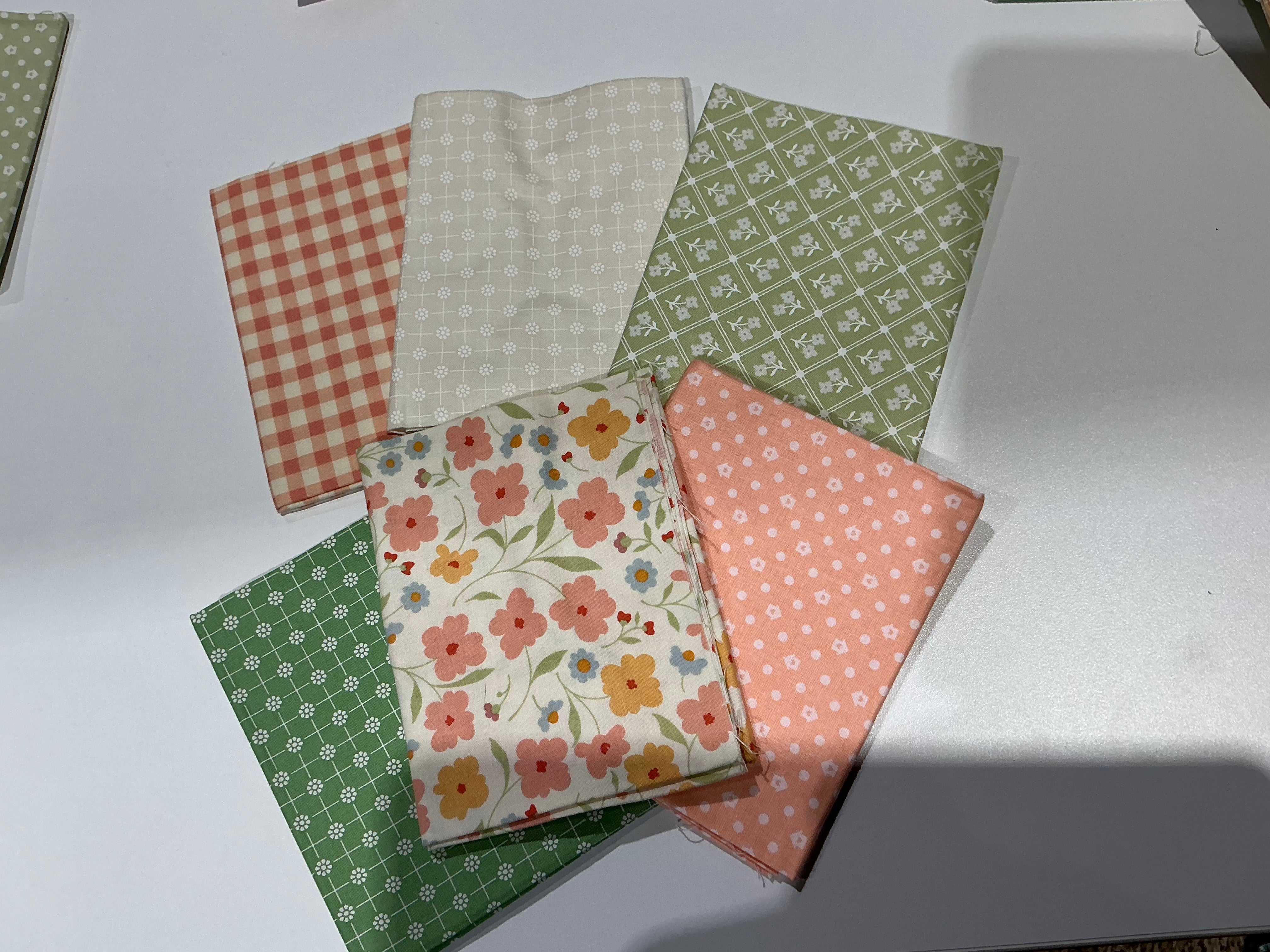 M50 Happy Go Lucky quarter-yard fabric bundle curated by Bella Rose Quilts for mini mystery quilt project