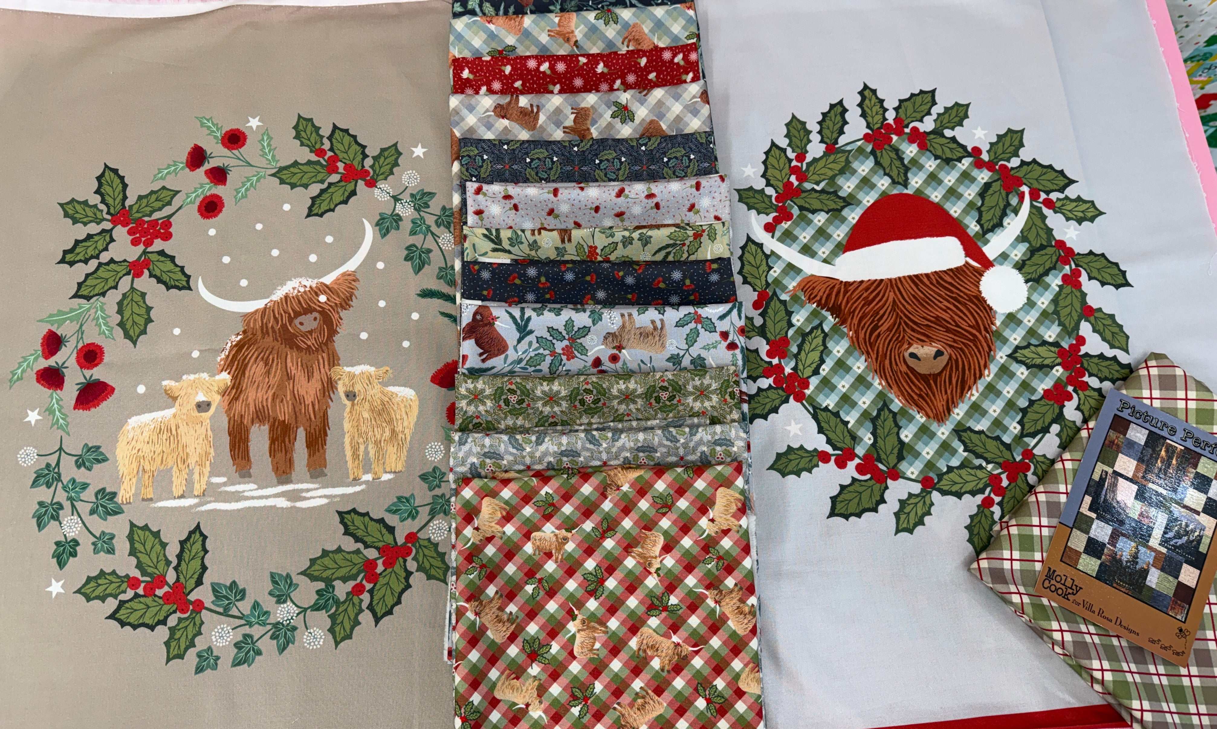 Picture Perfect panel quilt kit featuring Celtic Christmas highland cow panel and fabrics by Lewis & Irene