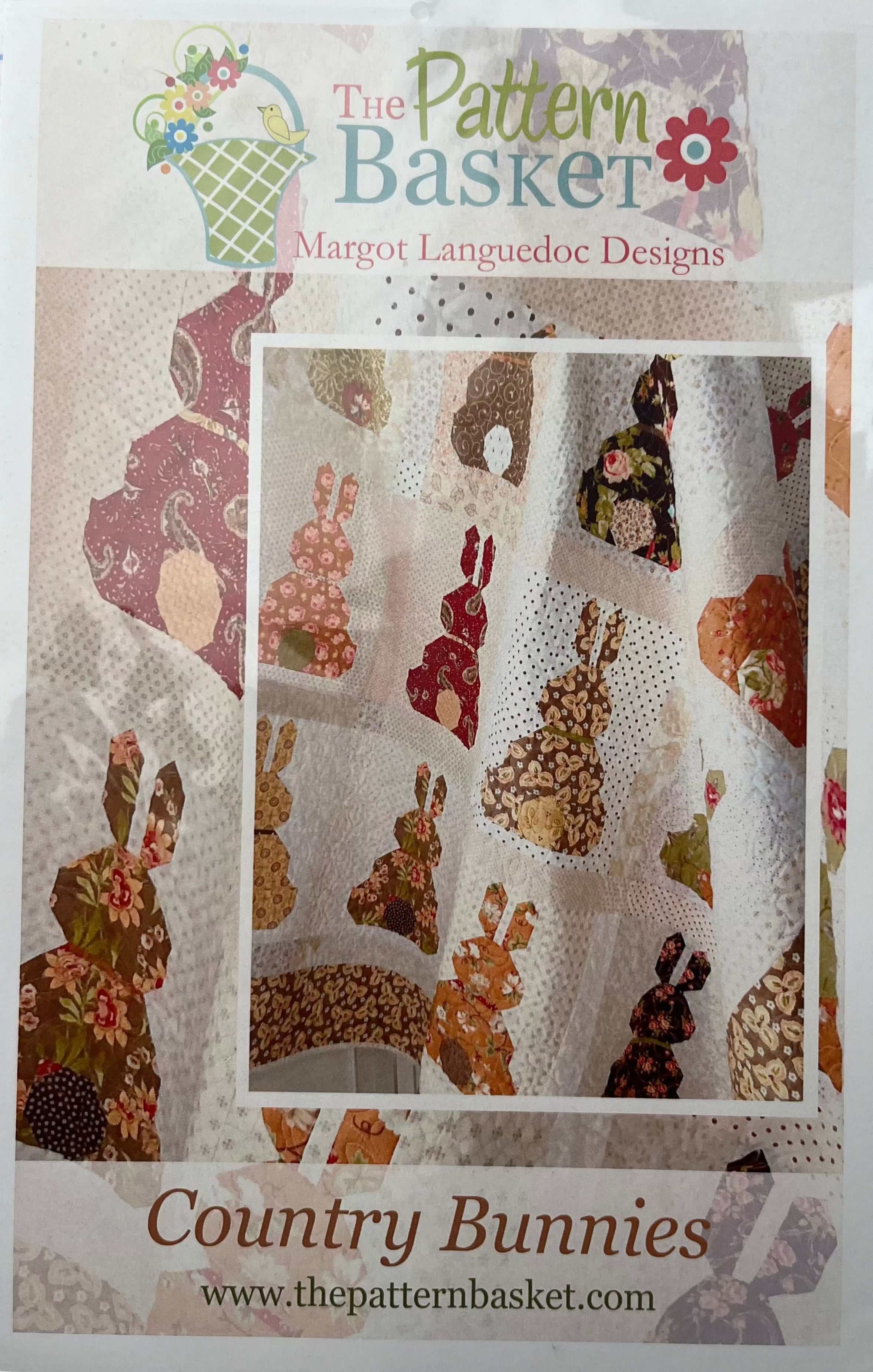 Country Bunnies quilt pattern by The Pattern Basket featuring colorful bunny silhouettes