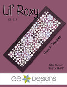 Lil' Roxy table runner pattern with 5-inch fabric squares and Stripology Squared Mini Ruler, measuring 15-1/2 by 39-1/2 inches