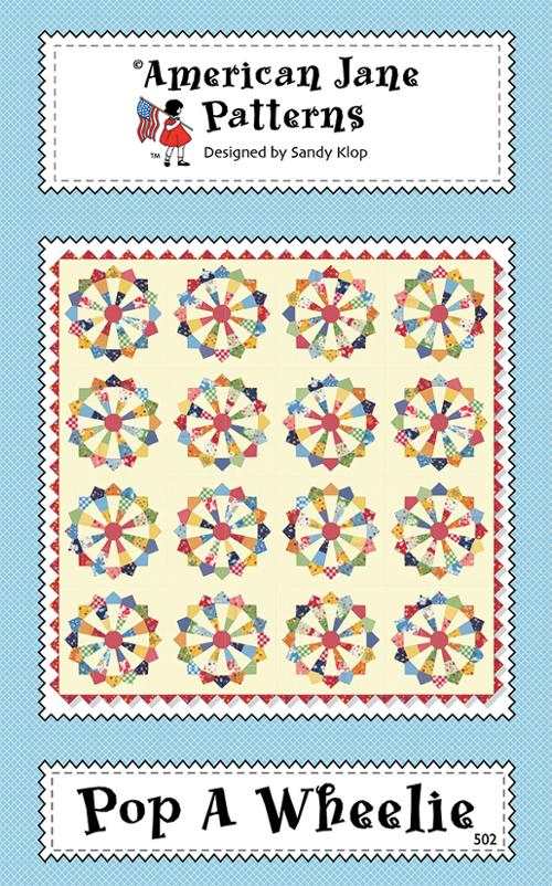 Pop A Wheelie quilt pattern by American Jane with colorful circular patchwork design