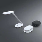 Foldi Go portable rechargeable desk lamp with adjustable arm and rotatable shade in carry case