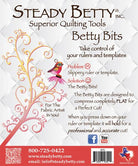 Betty Bits adhesive ruler grippers preventing fabric movement for accurate cutting