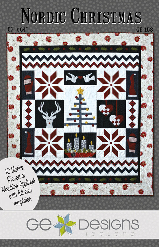 Nordic Christmas Pattern quilt featuring Scandinavian motifs of advent candles, folded paper hearts, and traditional snowflakes from Nordic Visions fabric line