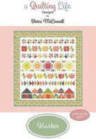 Harbor by Sherri McConnell quilt pattern with colorful geometric and floral designs, 52x57 inches project size