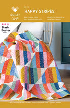 Colorful Happy Stripes quilt pattern by Emily Dennis, suitable for all quilt sizes and scrap fabrics