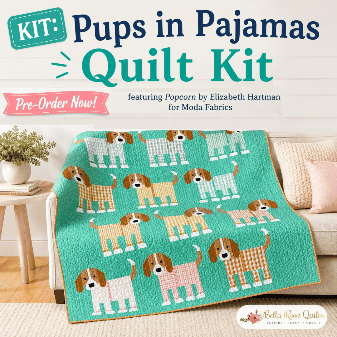 Pups in Pajamas quilt featuring dogs in striped pajamas from Popcorn collection by Elizabeth Hartman, Moda Fabrics pre-order kit
