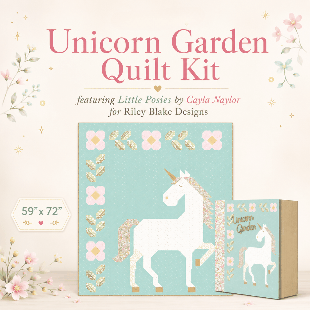 Unicorn Garden Quilt Kit with Little Posies fabric by Cayla Naylor showing quilt top and keepsake box