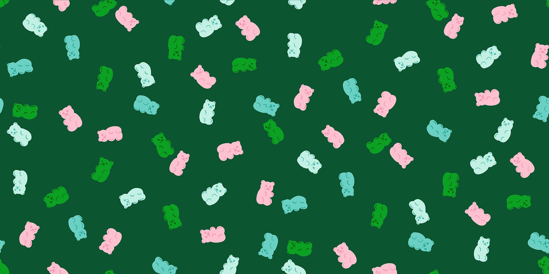 Merry Happy Merry Gummies Christmas-themed gummy bears fabric by Kimberly Kight with festive ornaments and lights pattern