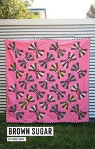 Brown Sugar Quilt Pattern by Jen Kingwell featuring colorful scrappy patchwork design