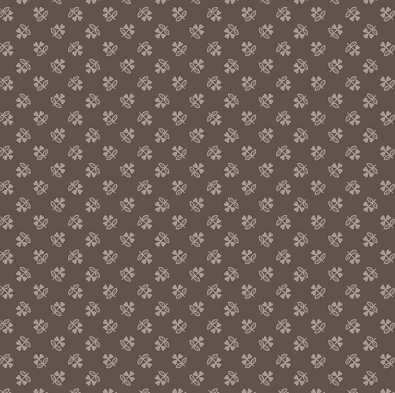 Farmer's Daughter fabric by Lori Holt with clover milk can pattern in brown and beige tones