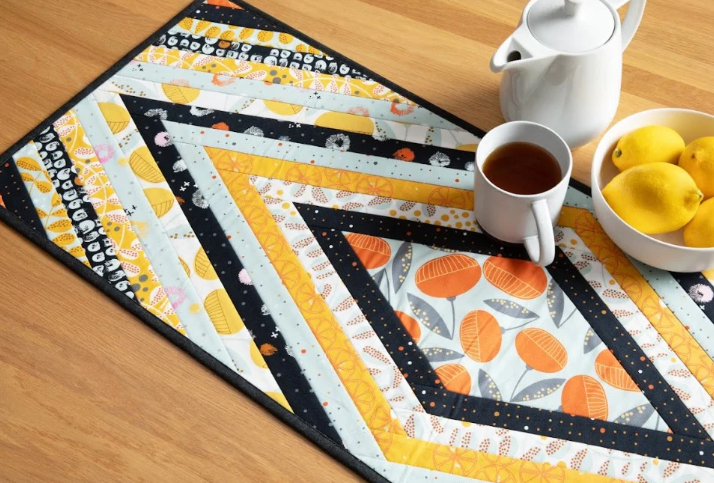 Log Jam Runner Quilt-As-You-Go Batting Kit for 14.5x42 inch table runner with fusible printed batting and full-color pattern