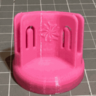 Pattern Stand Pink by Purple Hobbies LLC holding sewing patterns upright with weighted base
