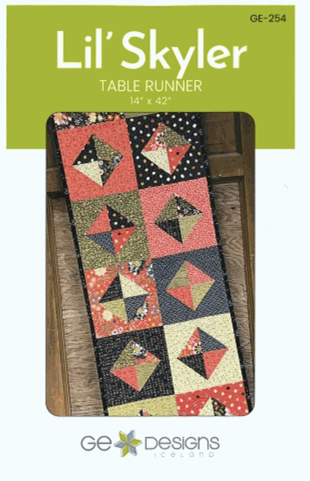 Lil Skyler pattern colorful pinwheel table runner by Gudrun Erla