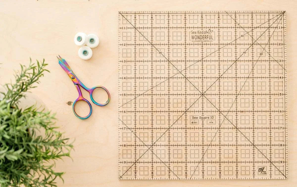Sew Square 10™ clear acrylic quilting ruler with black measurement lines and reference guides