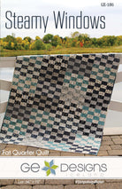 Steamy Windows Pattern quilt made with fat quarters featuring multiple size options and Stripology ruler for easy cutting
