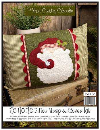 Ho Ho Ho Pillow Wrap kit with Santa applique, fabric, ric rac, and pillow cover instructions by The Whole Country Caboodle