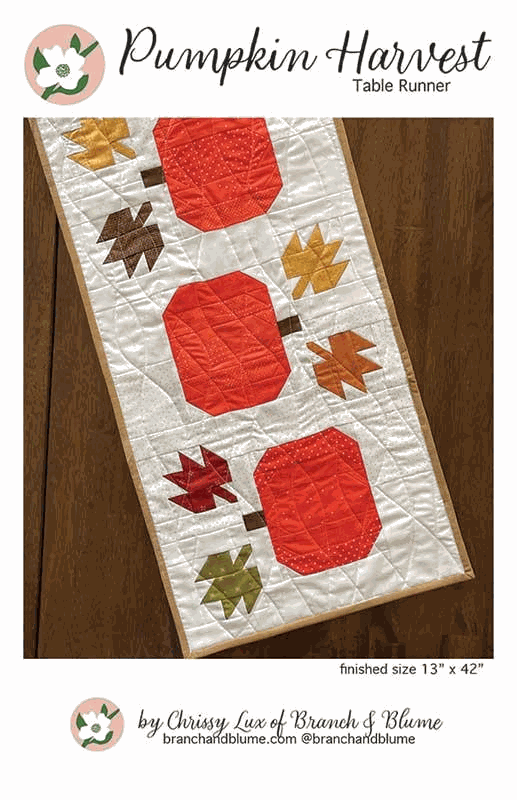Pumpkin Harvest Table Runner pattern with pumpkins and autumn leaves by Chrissy Lux for Moda Fabric, 13x42 inches size