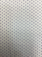 4 3/4 yard quilt backing fabric with small purple diamond pattern on white background