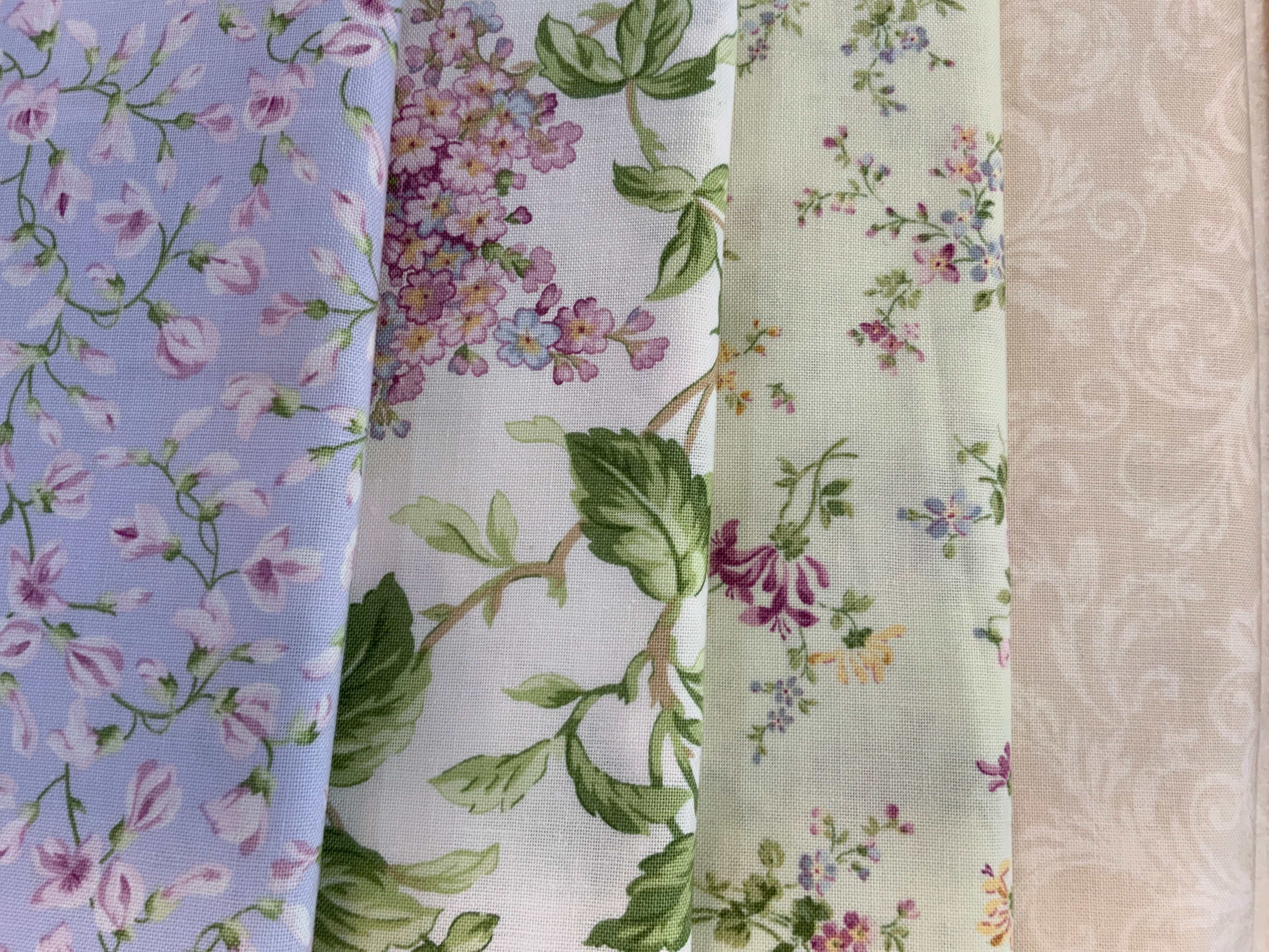 4-Yard Quilt Kit with floral and leafy fabric patterns in pastel colors