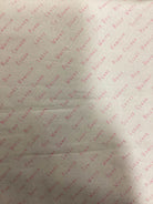 3 1/4 Yard Backing continuous quilt fabric with light beige background and pink text pattern