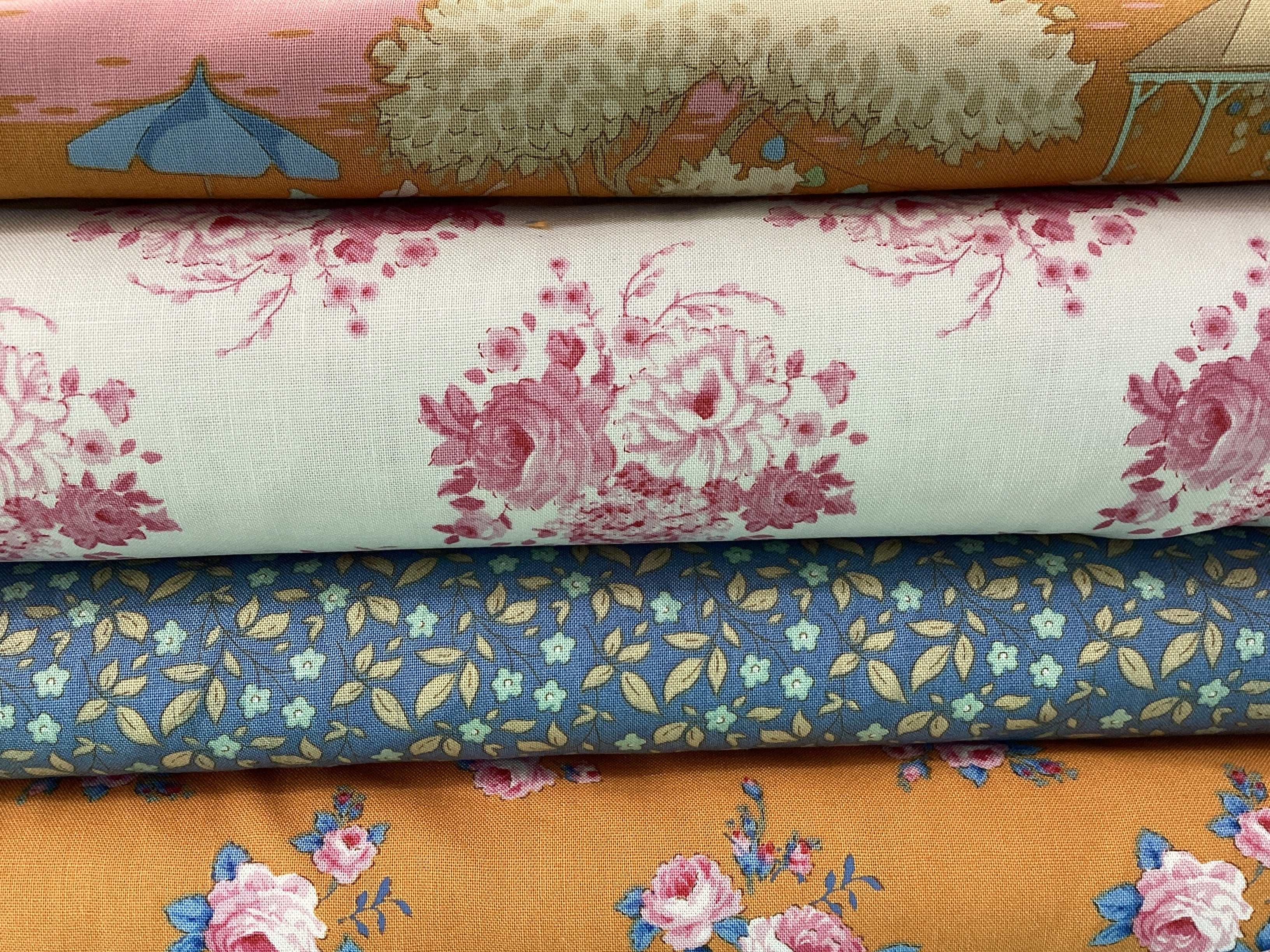 4 Yard Quilt Bundle with floral and nature-inspired fabric patterns stacked in four layers