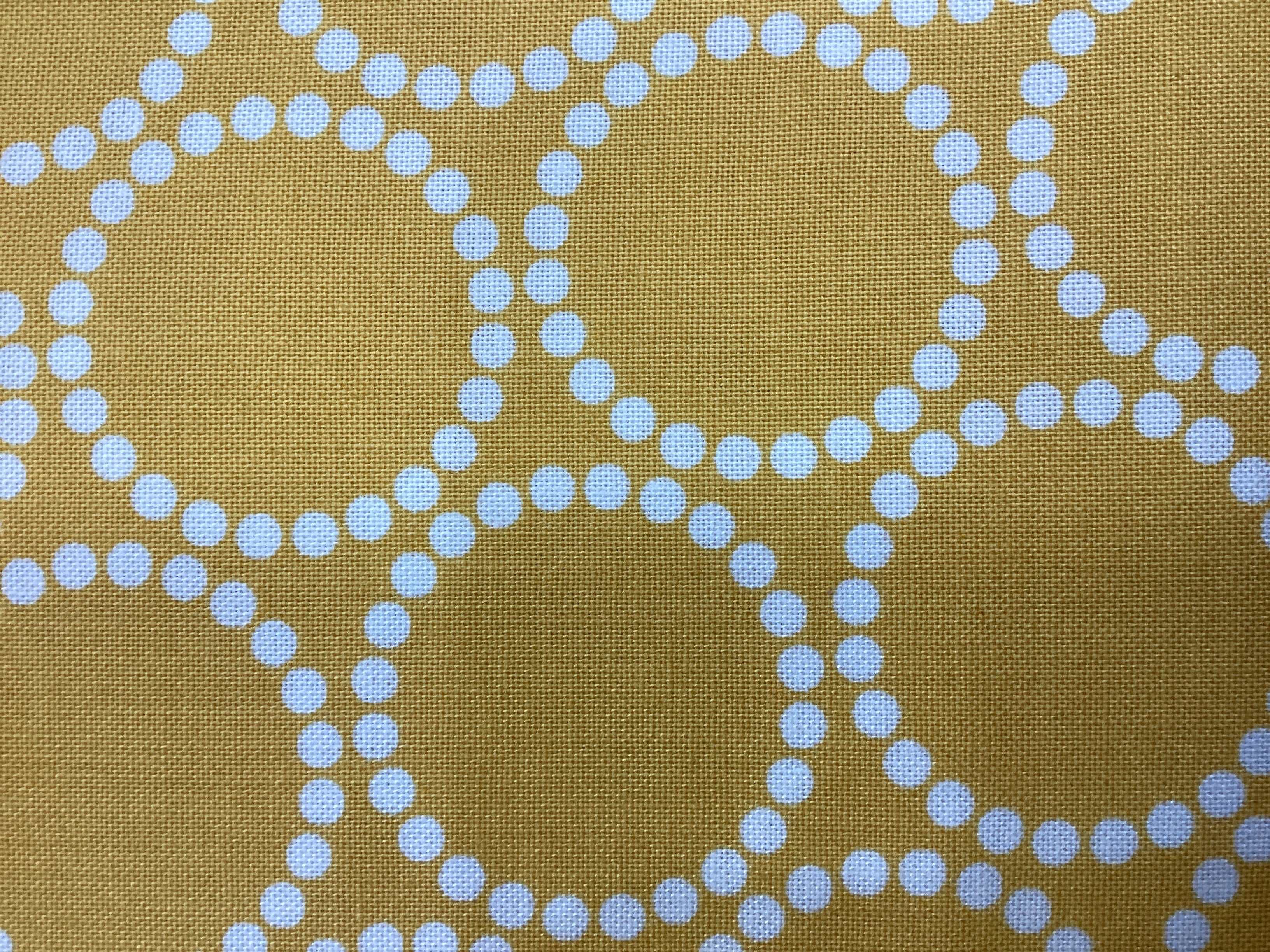3 1/2 yard backing fabric with white dotted circles on mustard yellow background for quilt backings