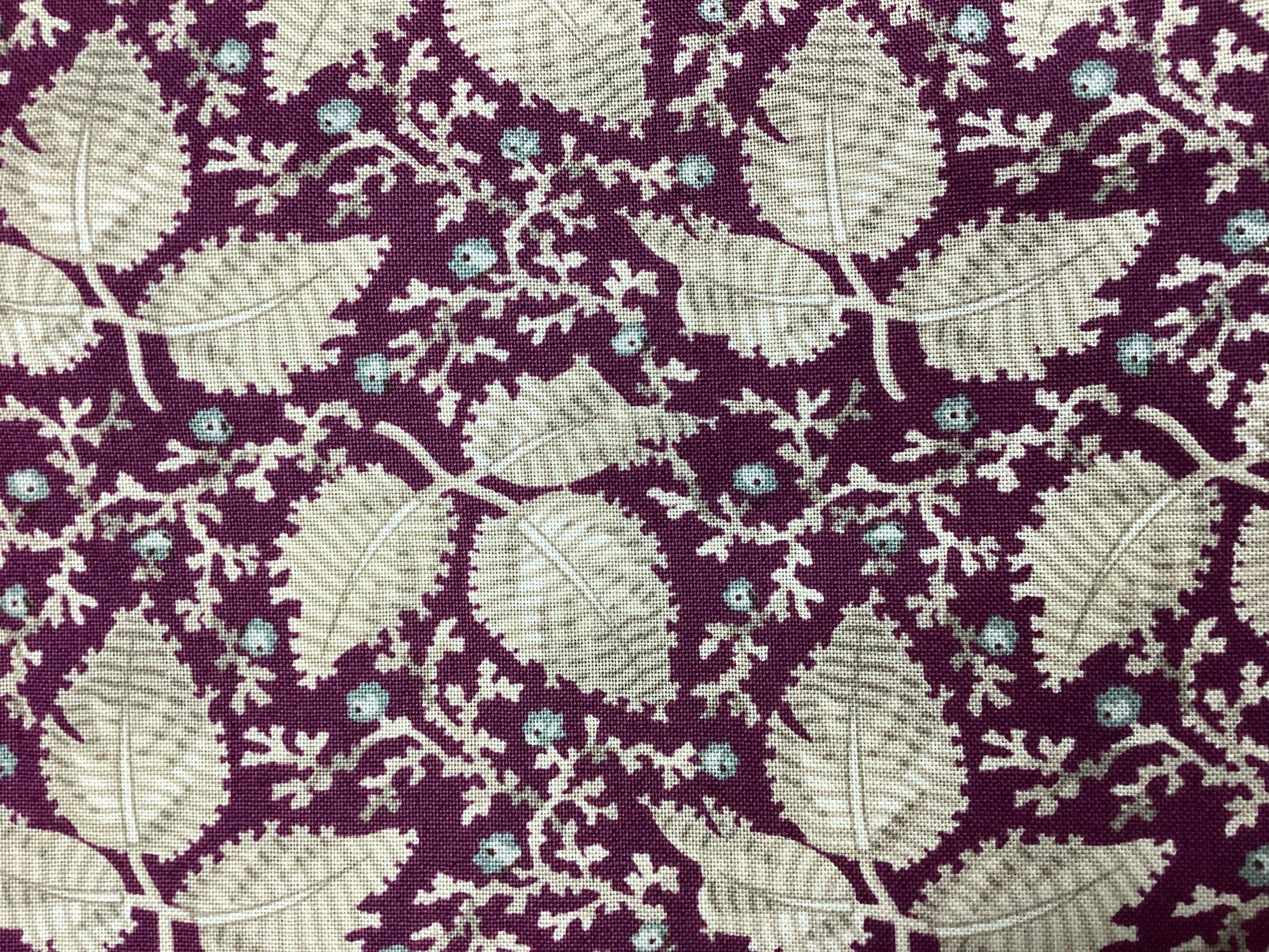 3 3/4 yard backing fabric with beige leaf pattern on purple background for quilt backing