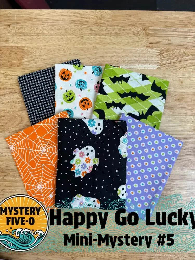M50 Happy Go Lucky quarter-yard fabric bundle curated by Bella Rose Quilts for mini mystery quilt project
