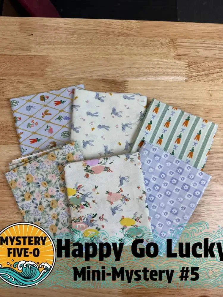 M50 Happy Go Lucky quarter-yard fabric bundle curated by Bella Rose Quilts for mini mystery quilt project