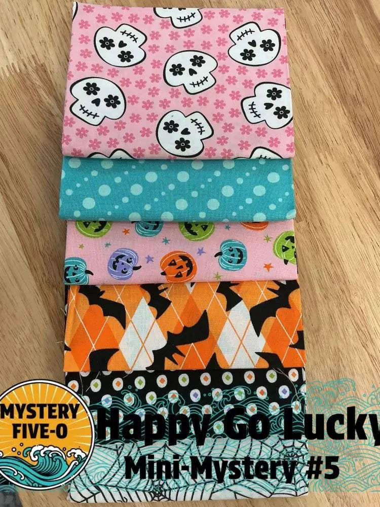M50 Happy Go Lucky quarter-yard fabric bundle curated by Bella Rose Quilts for mini mystery quilt event