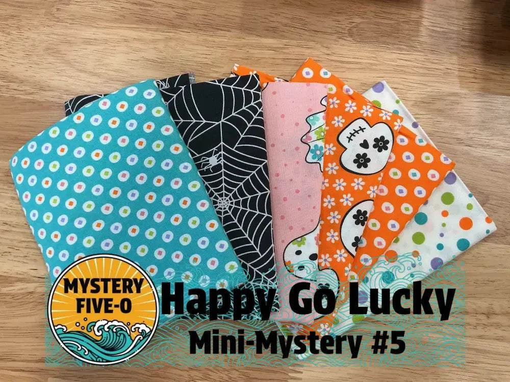 M50 Happy Go Lucky quarter-yard fabric bundle curated by Bella Rose Quilts for mini mystery quilt project
